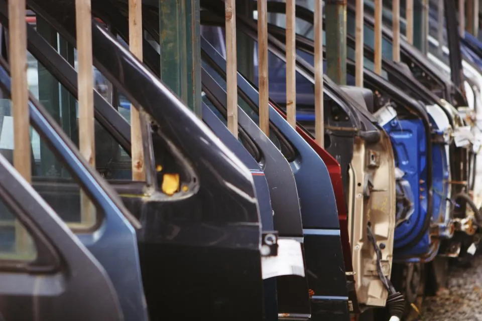 Car doors hanging on an automotive assembly line